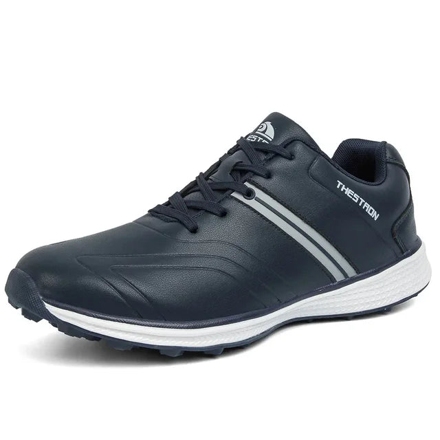 Sole of men's waterproof golf shoe, showcasing multi-directional fixed spikes for optimal grip & traction.