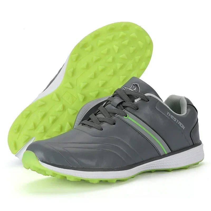 Front view of men's waterproof golf shoes with secure lacing and visible fixed spike traction for performance.