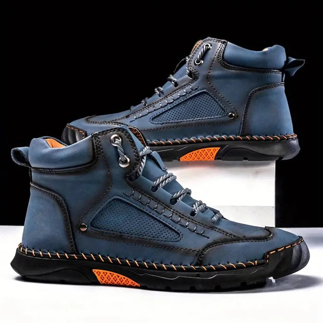 Side view of men's waterproof hiking boots, showcasing their durable design and supportive features.