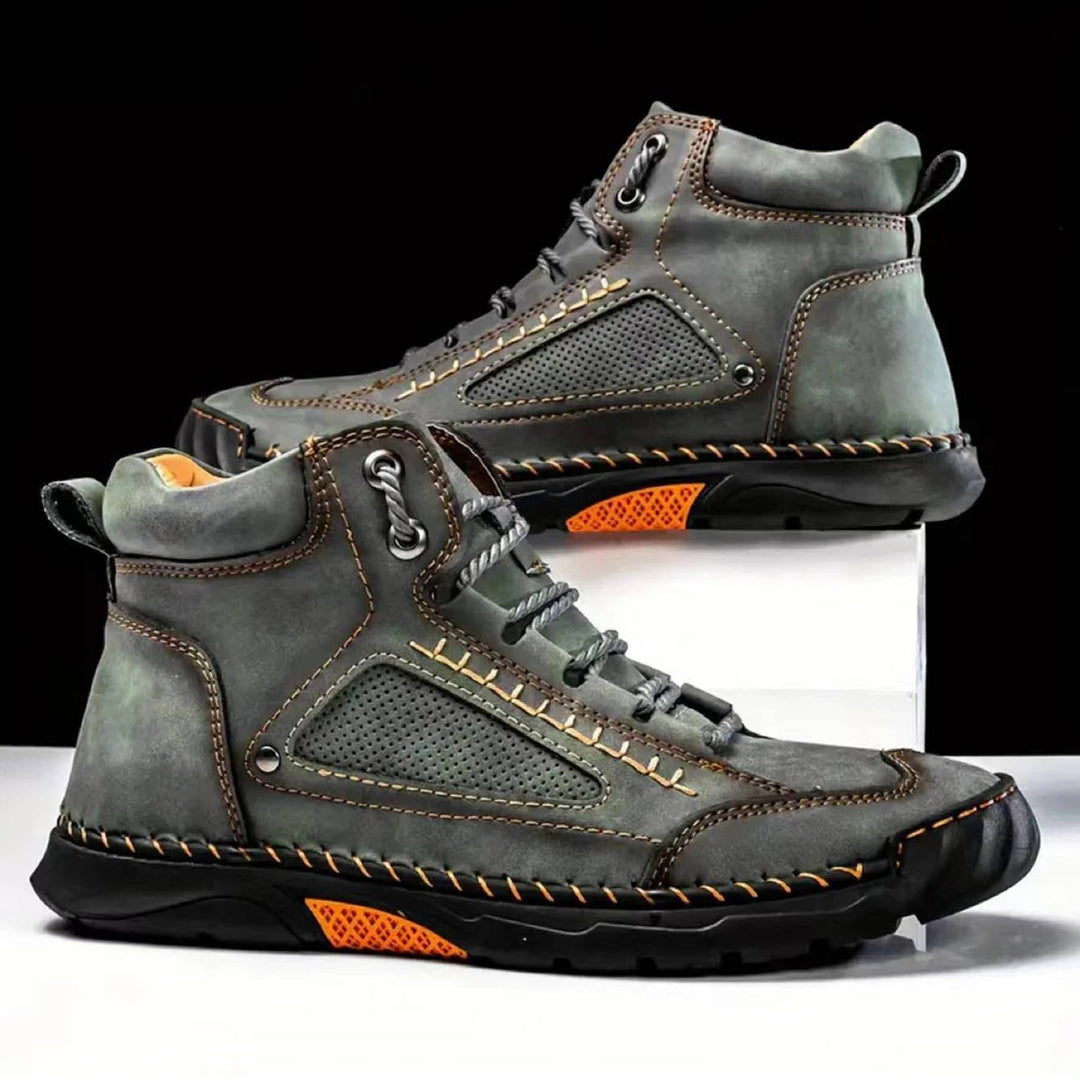 Men's waterproof hiking boots on a mountain trail, ready for adventure and all-season comfort.