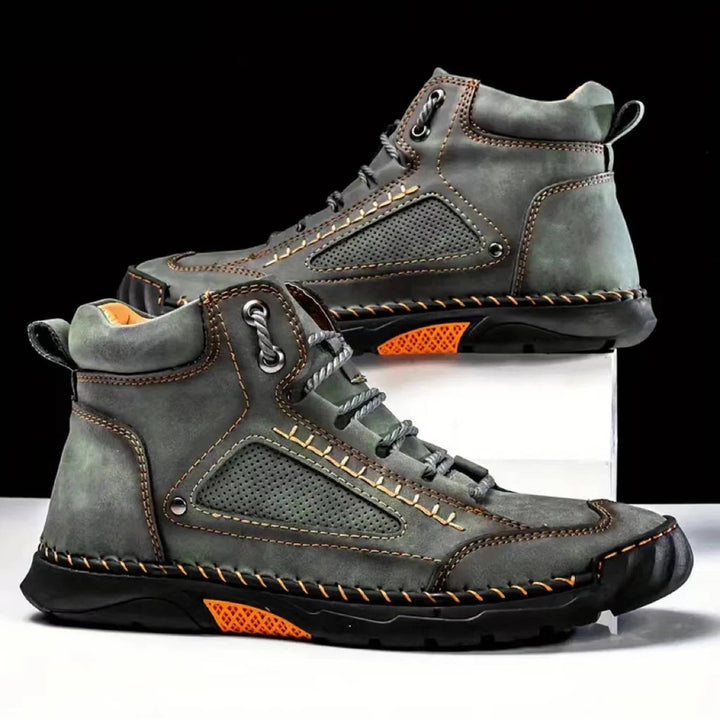 Men's waterproof hiking boots on a mountain trail, ready for adventure and all-season comfort.