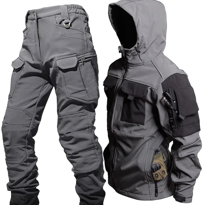 Men's waterproof outdoor jacket & pants set. Ideal for hiking, trekking, and extreme weather protection.