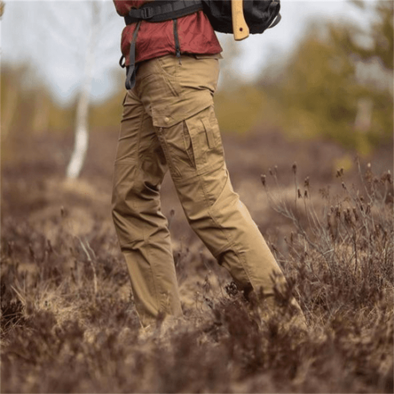 Men's waterproof tactical cargo pants for hiking & outdoor adventures.