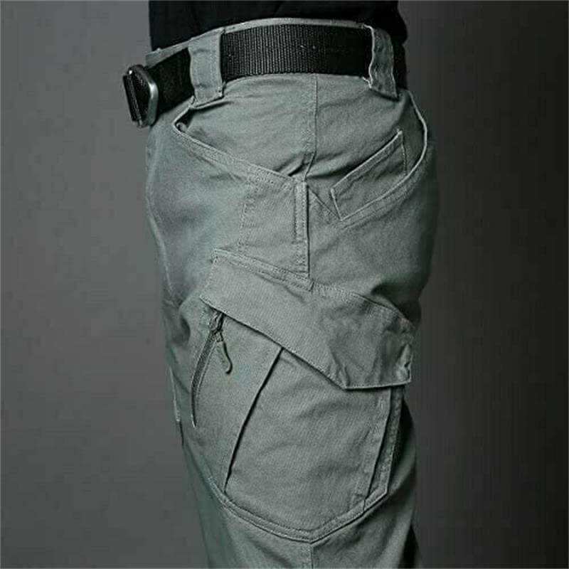 Functional men's waterproof tactical cargo pants with multi-pockets for outdoor use.
