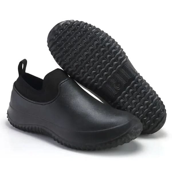 Close-up of slip-resistant sole on men's & women's all-weather work shoes, showing durable traction.