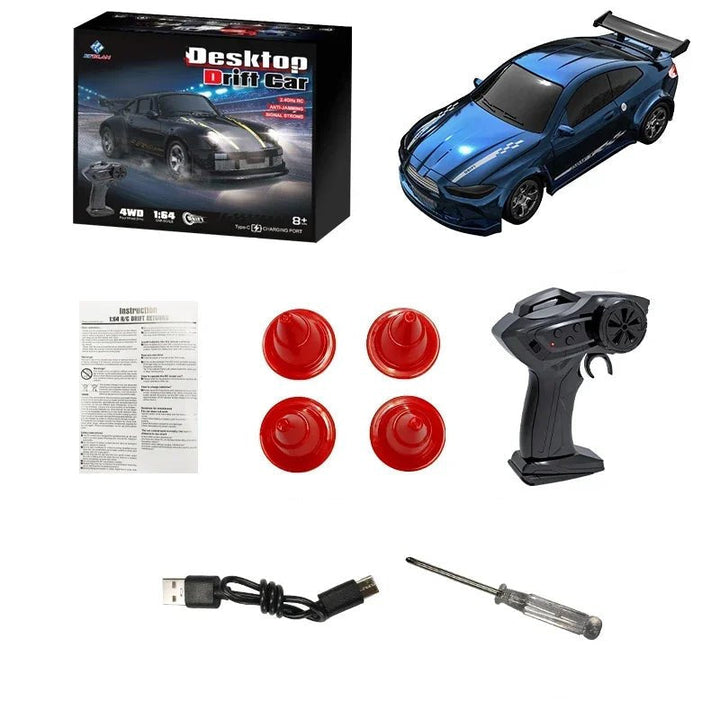 Remote control unit next to a mini 4WD RC car, highlighting stable and easy operation.