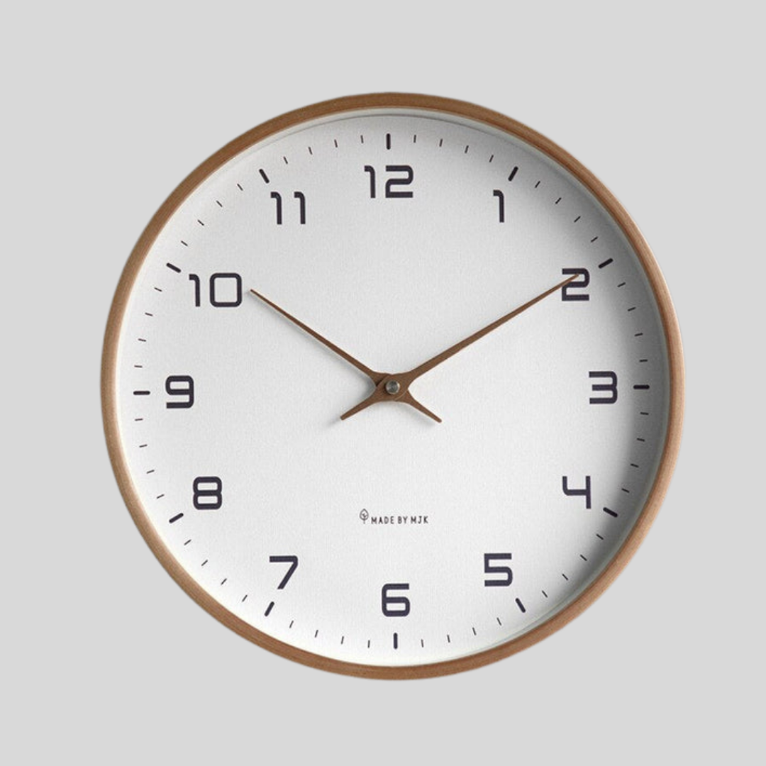 Minimalist round wooden wall clock for modern living rooms, bedrooms & offices. Silent quartz movement for serene decor.