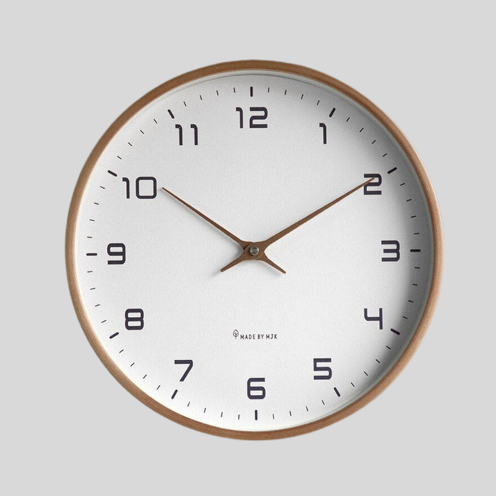 Minimalist round wooden wall clock for modern living rooms, bedrooms & offices. Silent quartz movement for serene decor.