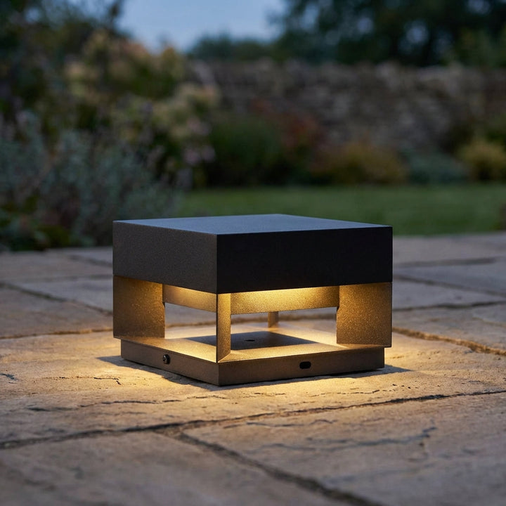 Minimalist square outdoor LED wall light, perfect for illuminating patios & garden pathways. Weather-resistant.