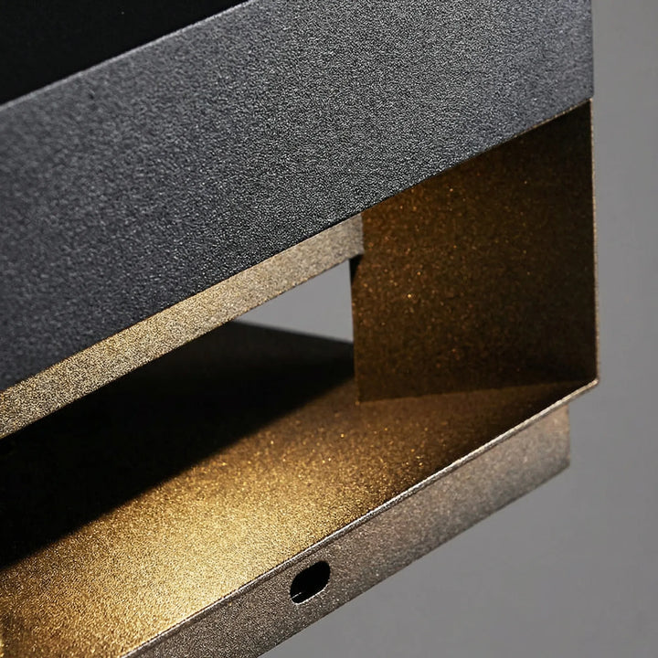 LumaBloc minimalist square LED wall light for exterior home lighting. Durable & weather-resistant patio lamp.