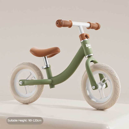 Mint green children's lightweight balance bike for toddlers learning to ride, outdoor play equipment.