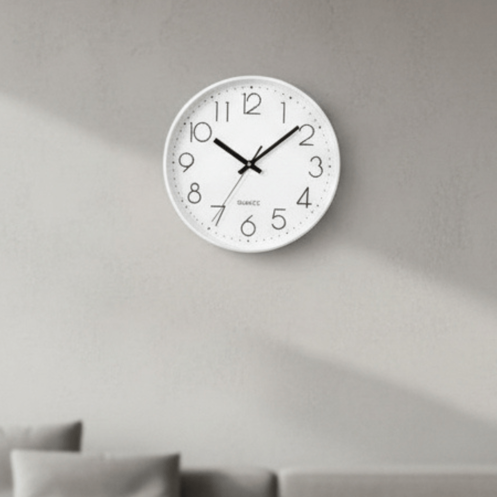 Modern 12-inch quiet quartz wall clock for living room. Silent, non-ticking contemporary design.