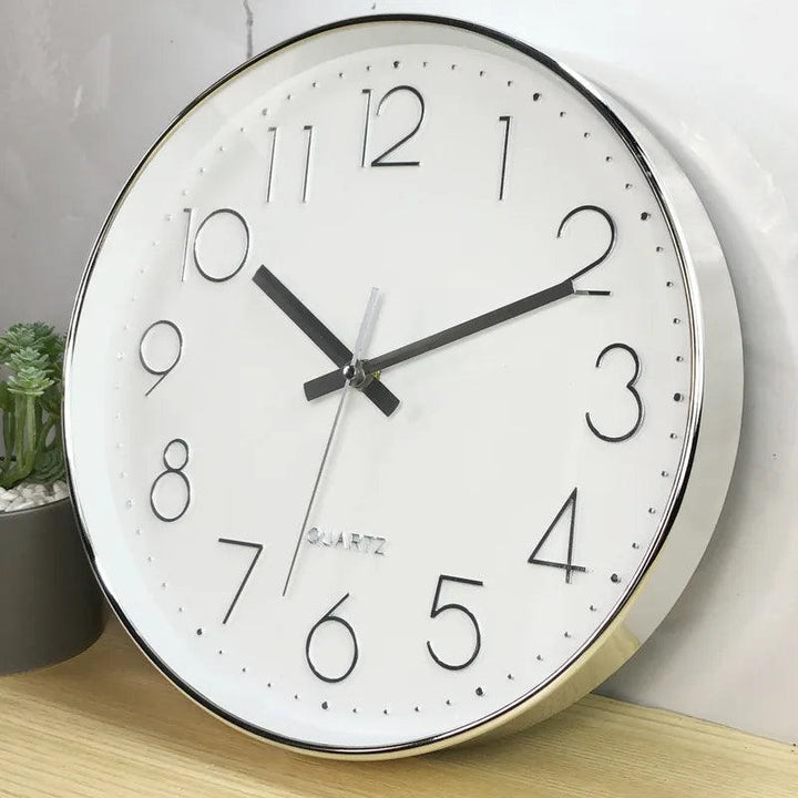12-inch modern quiet quartz wall clock. Round, silent, contemporary design for living room decor.