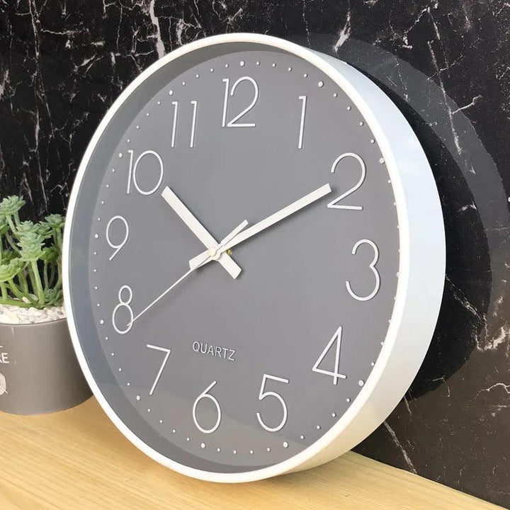 Versatile 12-inch quiet wall clock, non-ticking quartz for modern home, office, or bedroom decor.