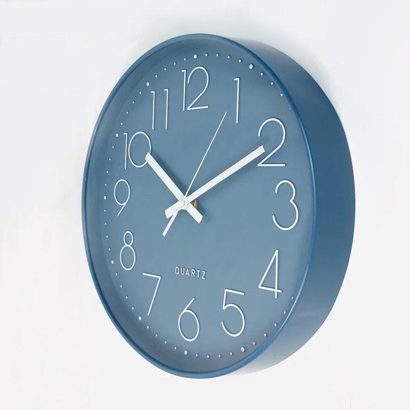 Contemporary 12-inch round wall clock, quiet quartz movement, perfect for office or bedroom decor.
