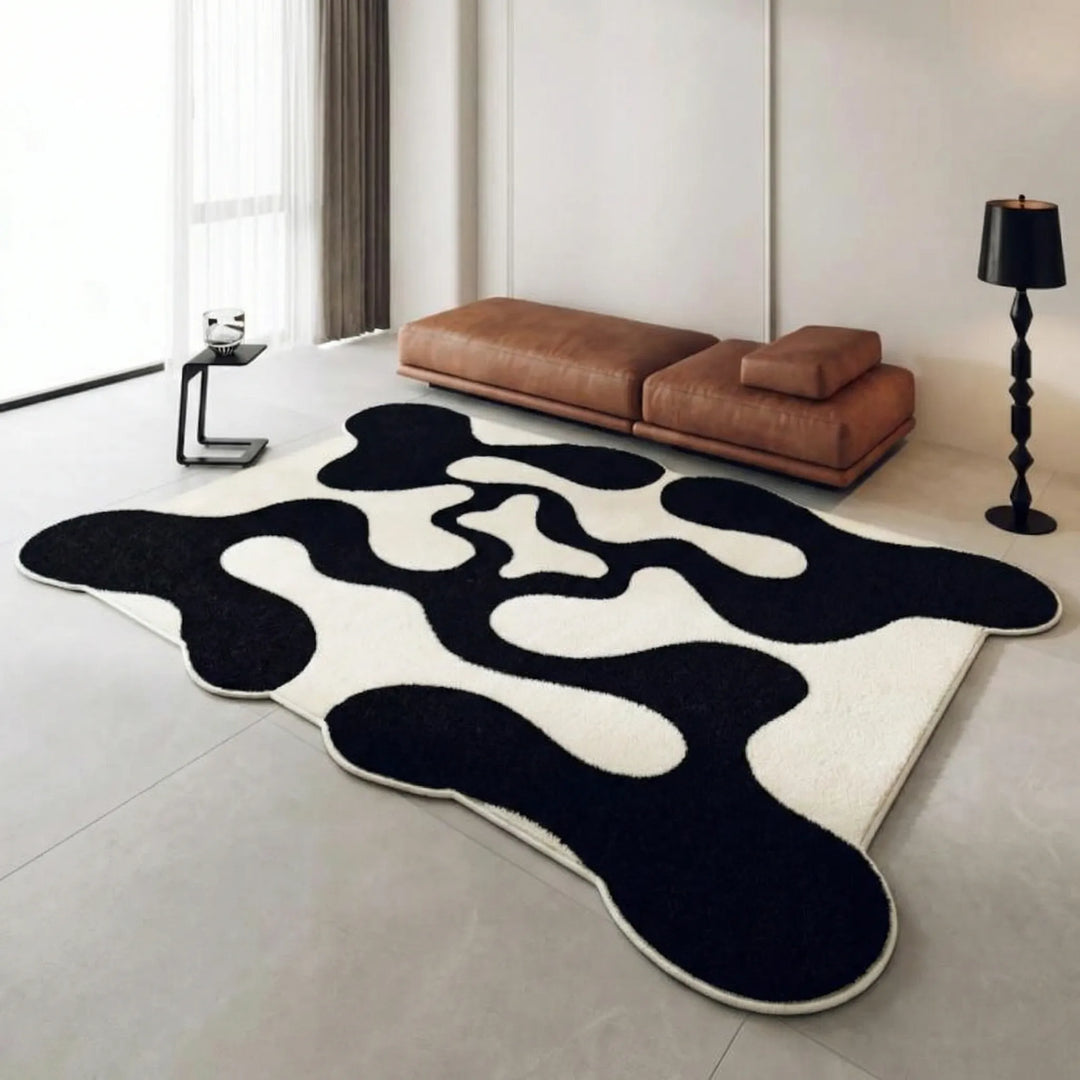 Modern abstract wave area rug for contemporary living rooms. Flowique geometric floor covering adds a stylish statement.