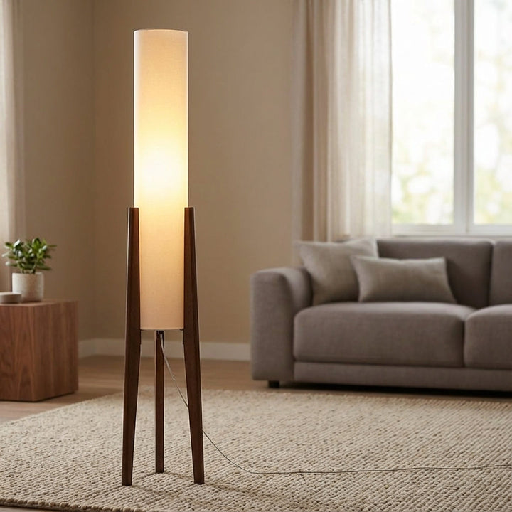 Modern ambient living room floor lamp, sleek wood design for elegant home decor and soft lighting.