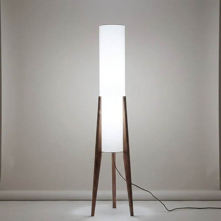 Contemporary wood floor lamp, perfect for ambient lighting in a stylish living room; LED compatible.