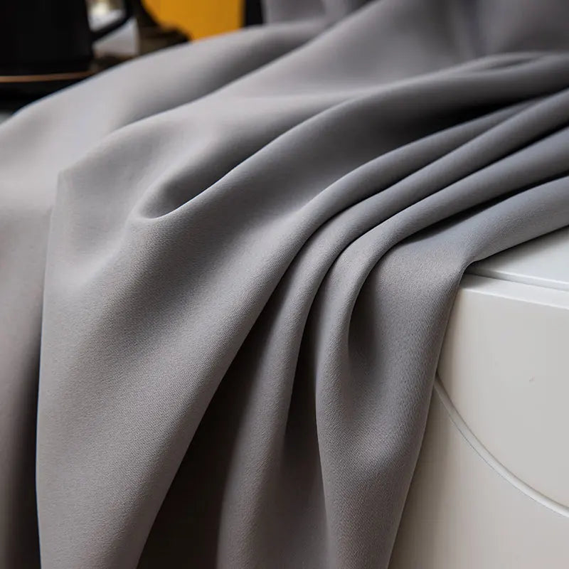 Thick room darkening curtains in black, ideal for bedroom privacy and light blocking window treatment