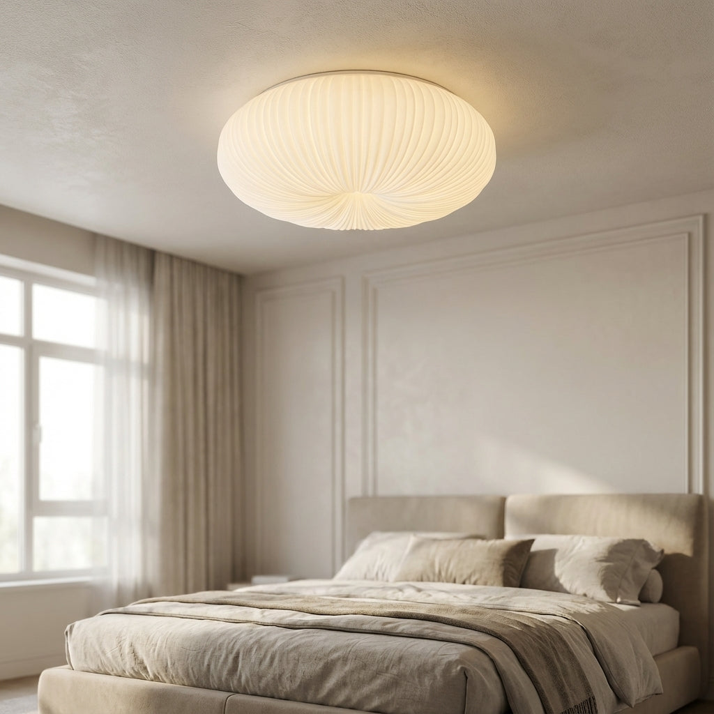 Modern Ciravine flush mount LED ceiling light, dimmable for soft ambient lighting in living rooms or bedrooms.