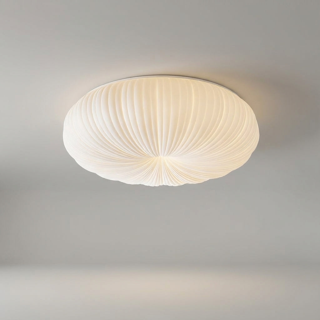 Modern LED flush mount ceiling light, energy-saving for dimmable ambient illumination in bedrooms and living rooms.
