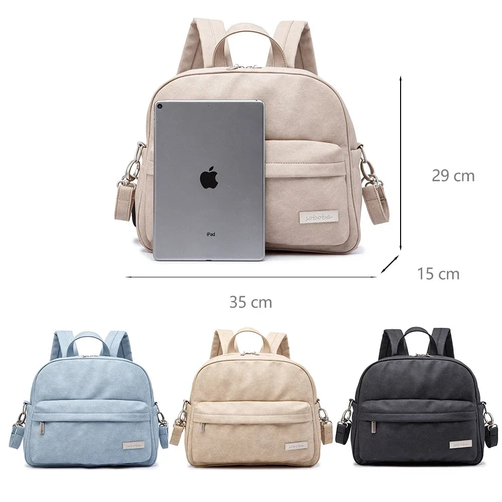 Stylish black PU leather diaper backpack, functional for organizing baby essentials, baby gear