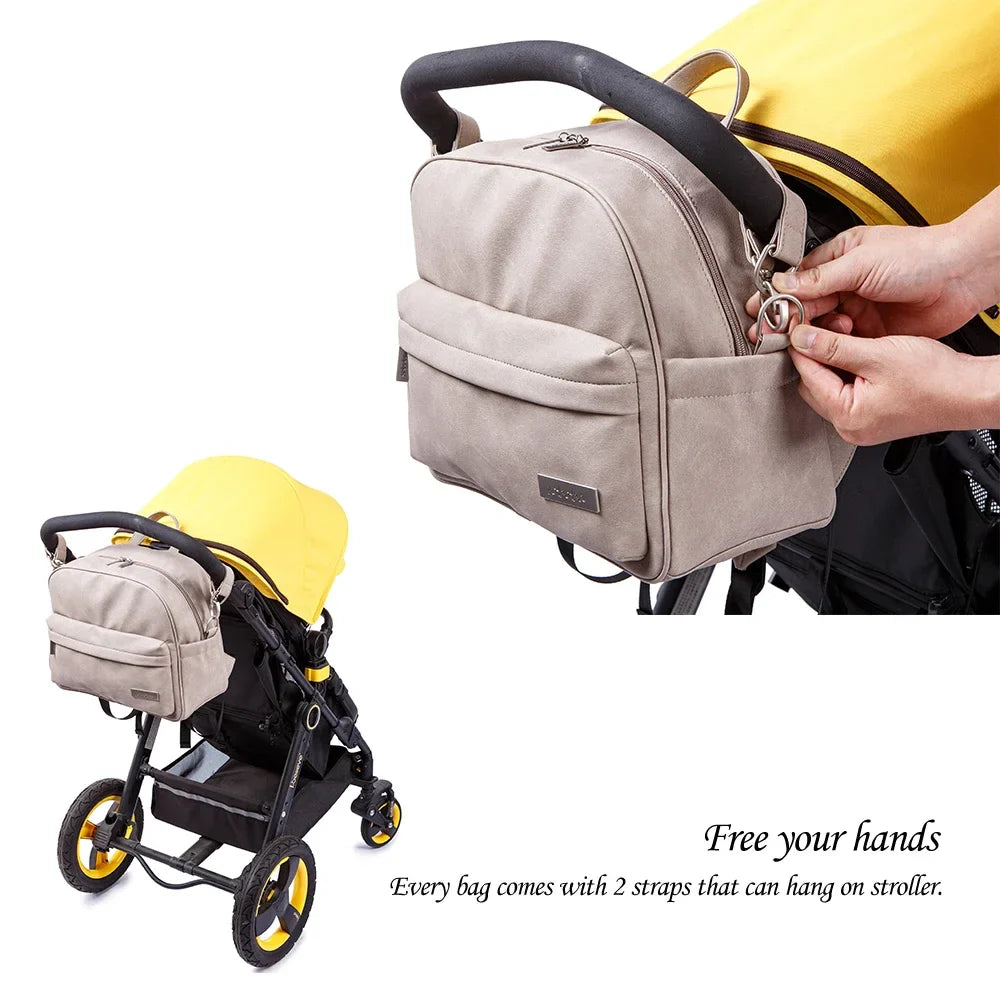 Elegant PU leather diaper backpack, great organization for baby essentials & parent items, travel bag