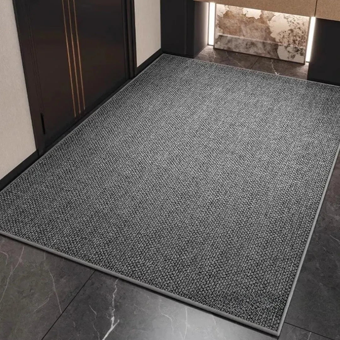 Contemporary geometric doormat, excellent dirt trapping and moisture absorption for a clean, modern entryway.