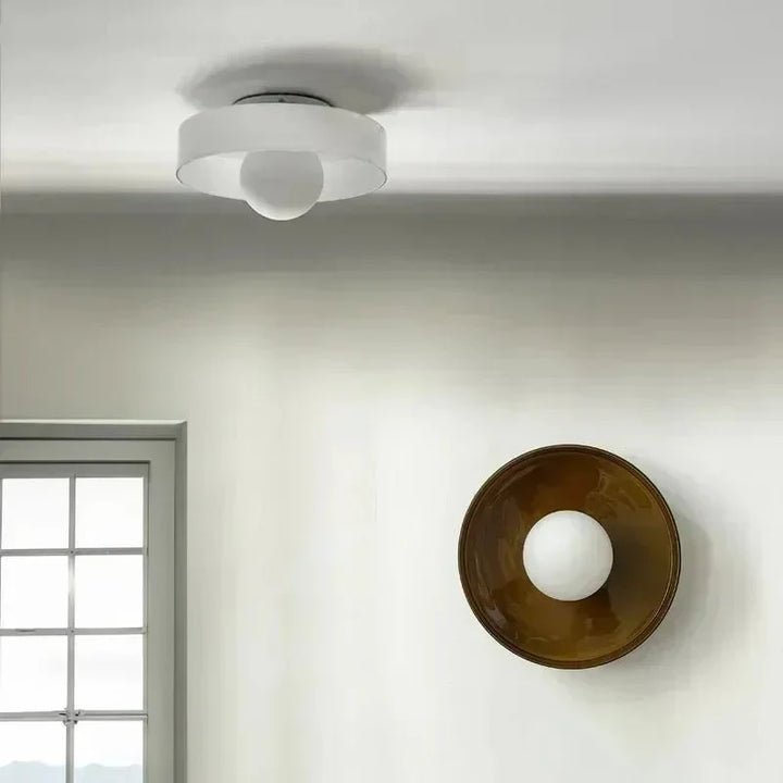 Sleek glass ceiling fixture, modern pendant light for interior home decor.