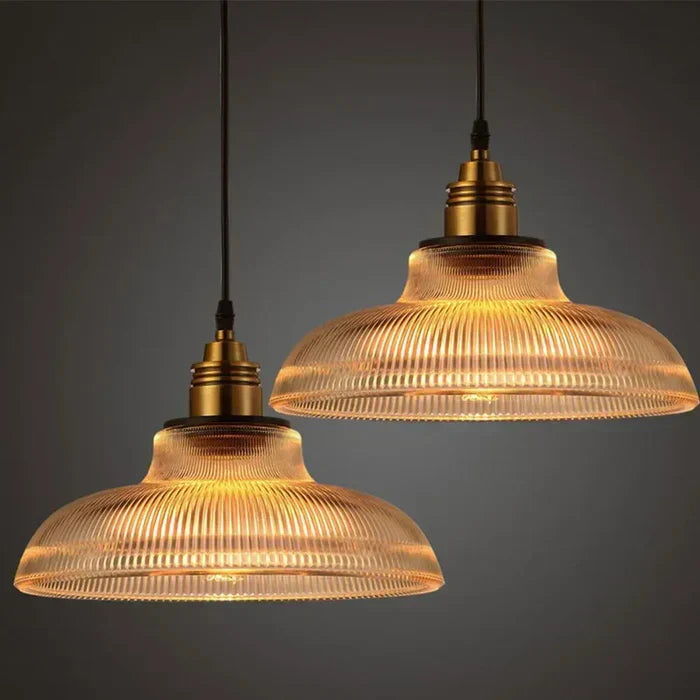 Modern glass pendant light fixture, elegant ceiling lamp for contemporary home decor & ambient lighting.