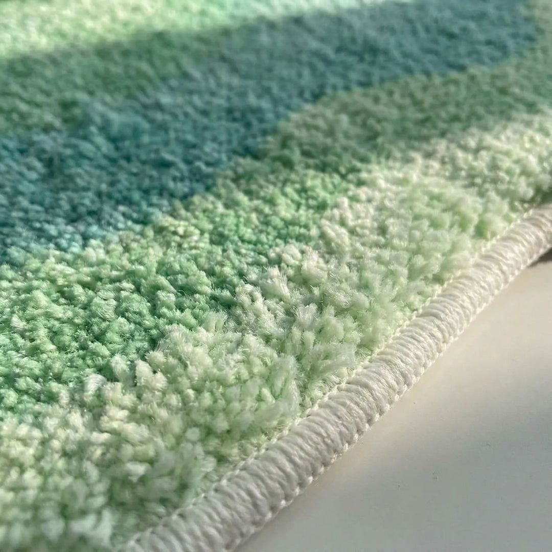 Soft non-slip gradient rug with a wavy pattern, ideal accent for contemporary home decor.
