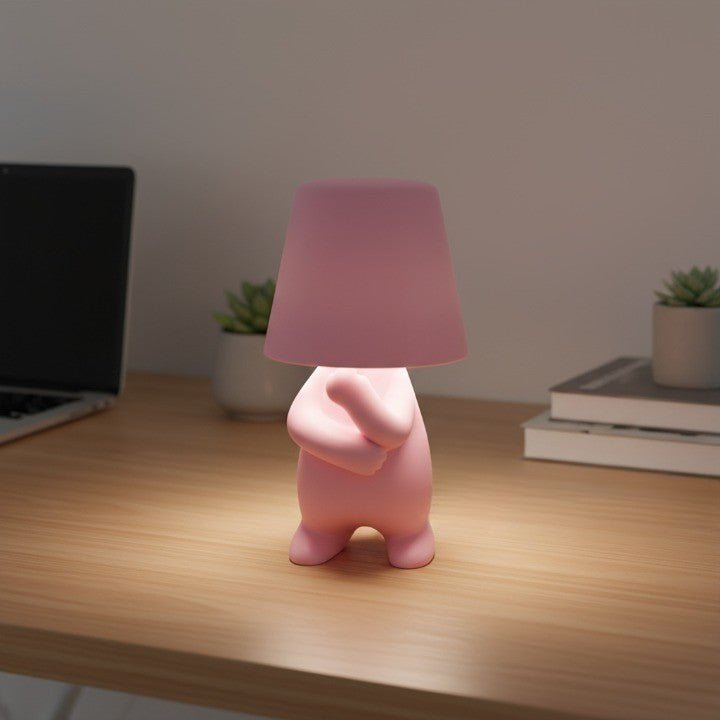 Artistic human-shaped LED table lamp, perfect for modern room decor & ambient lighting.