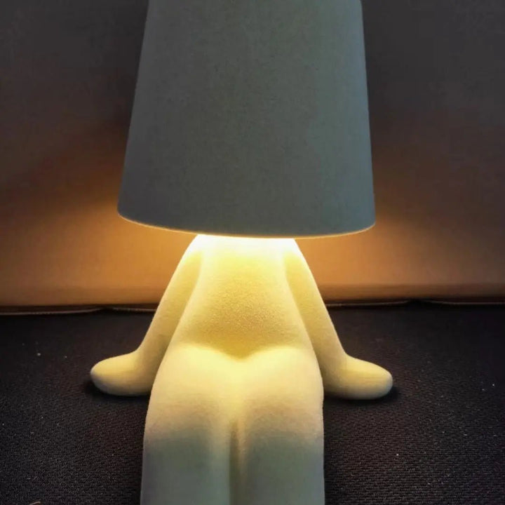 Unique human body LED light, a modern table lamp bringing artistic flair to your room decor.