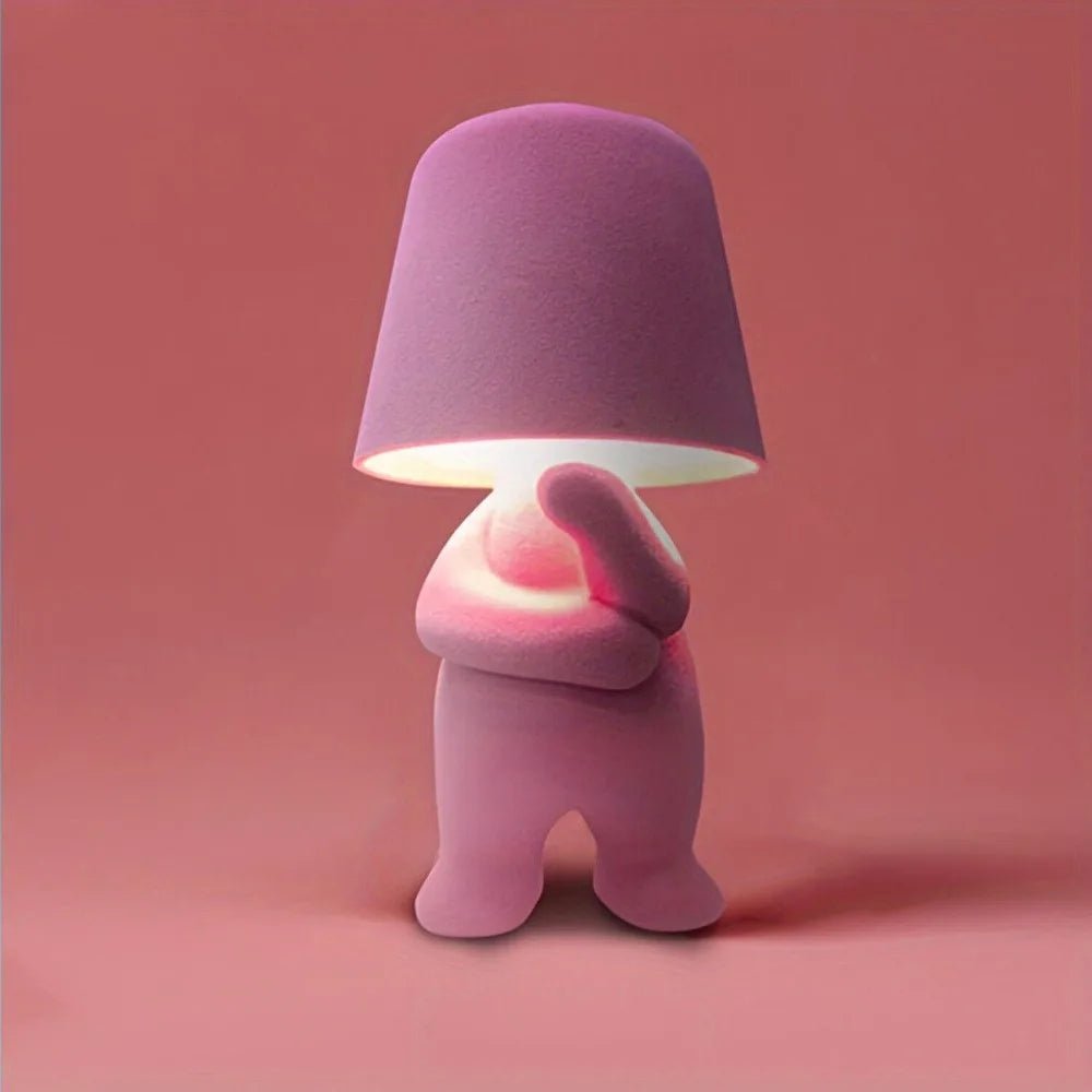 Creative human form LED desk light, perfect for modern workspace decor and artistic illumination.
