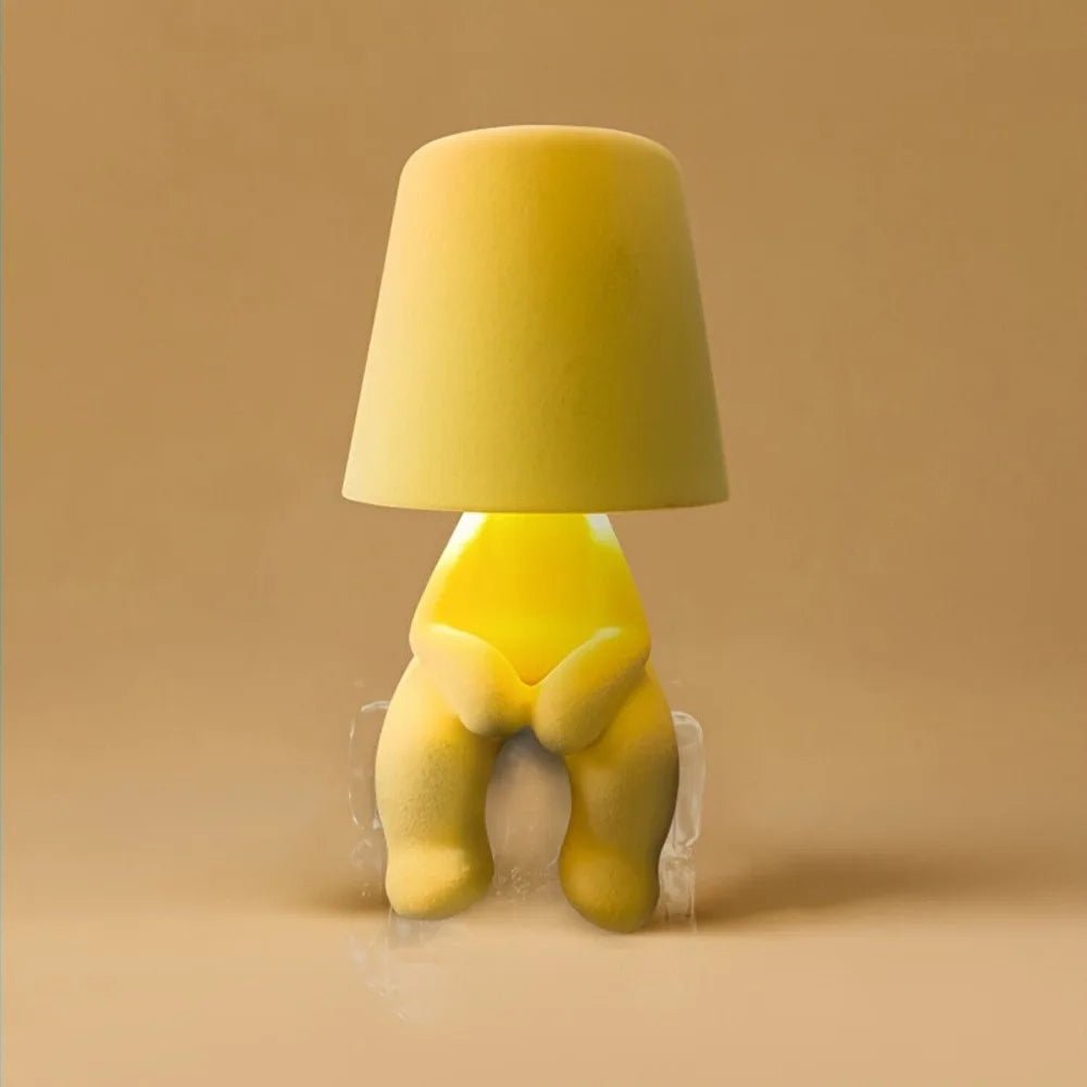 Artistic human statue LED lamp, rechargeable and perfect for ambient room lighting & decor.