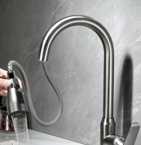Smart touch kitchen faucet with a powerful pull-out spray head, ideal for modern kitchen or utility sink tasks.