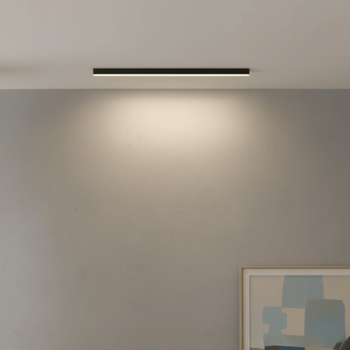 Sleek minimalist LED flush mount fixture, ideal for contemporary living spaces.
