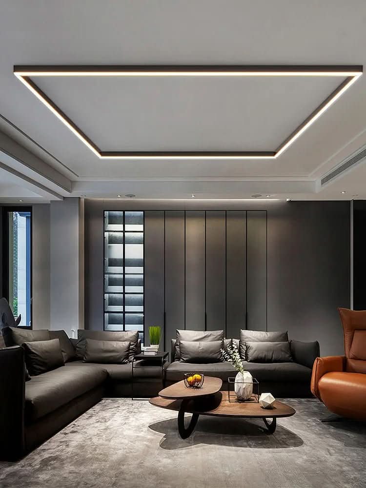 Minimalist LED ceiling light, complements Scandinavian and modern interior designs.