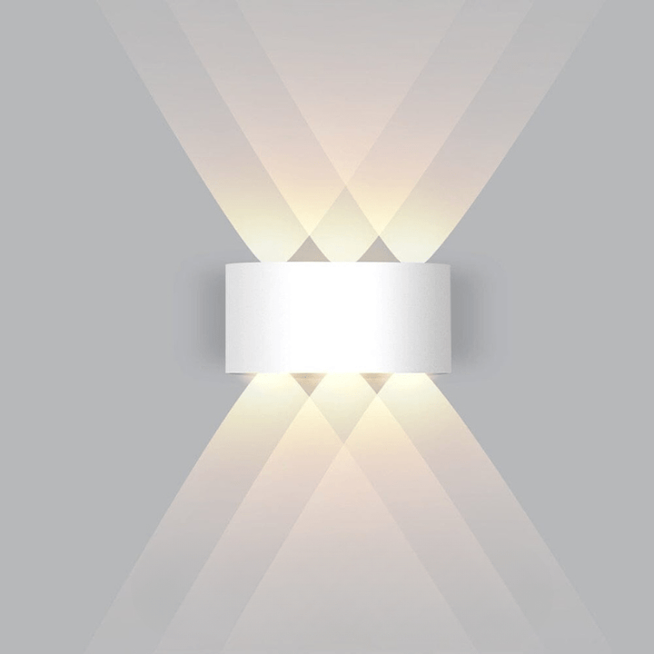 Durable LED wall light for outdoor use. Weatherproof, modern design for driveways, patios, or garden paths.