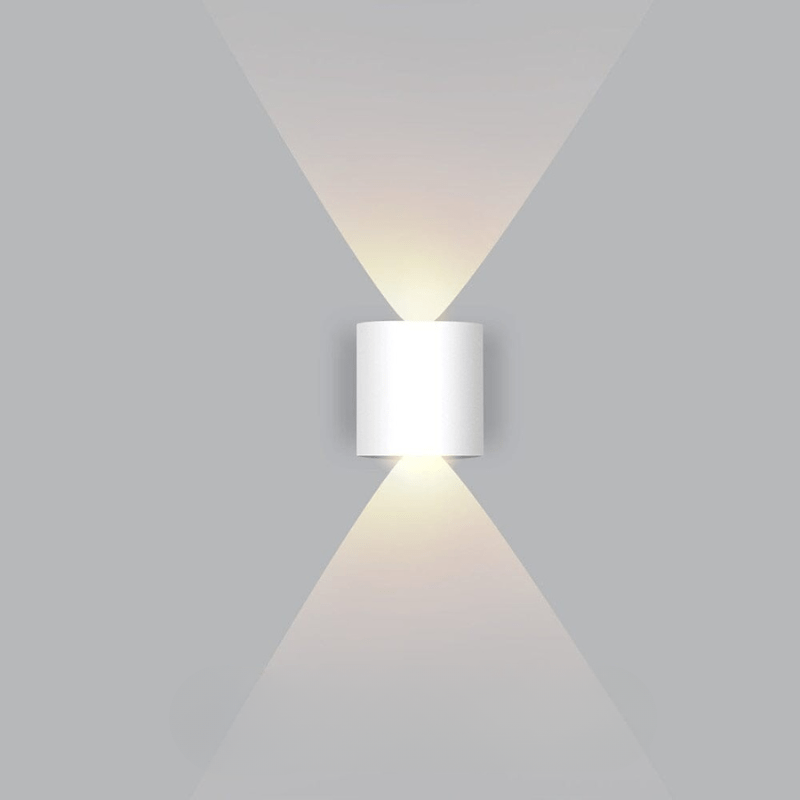 Modern LED outdoor wall light mounted on a house, providing energy-efficient & weatherproof exterior illumination.