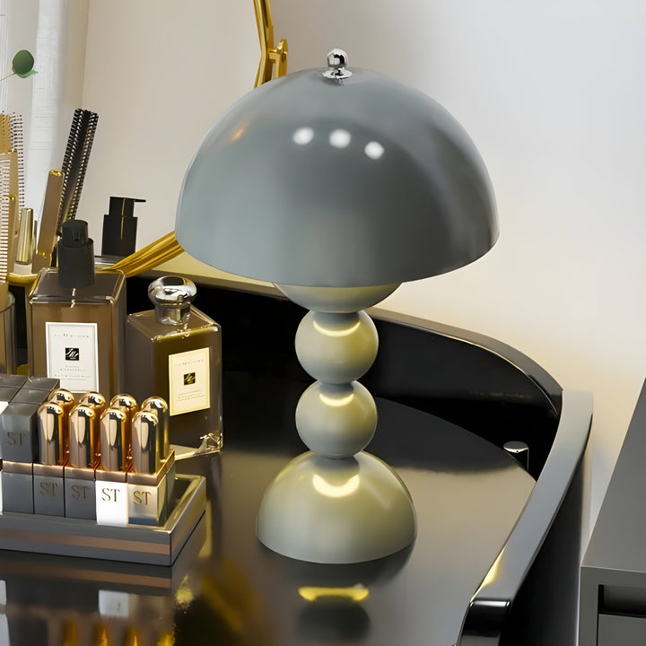 Sleek modern LED table lamp, dimmable, enhancing office or home space.