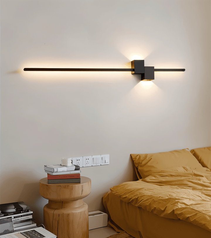 Wall-mounted energy-efficient LED accent light, creating soft indirect modern ambiance.