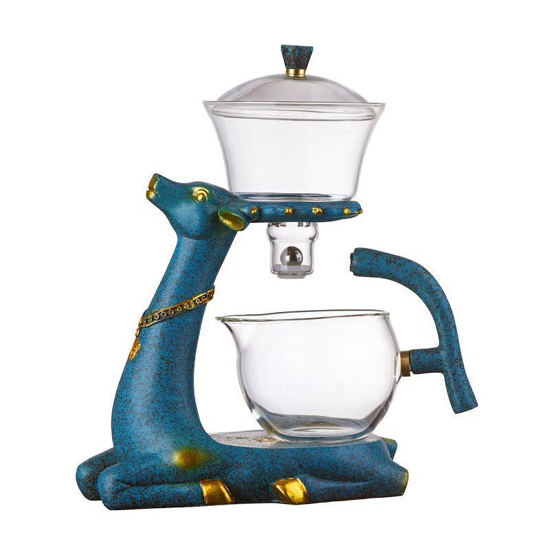 Modern magnetic glass tea set for automatic brewing of loose leaf tea, ideal for contemporary tea rituals & home decor.