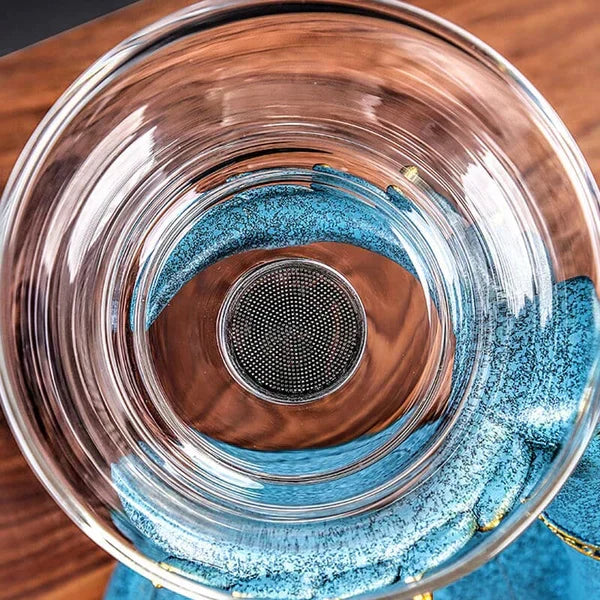 Elegant glass magnetic tea set beautifully displayed as home decor, perfect for modern kitchens and tea enthusiasts.