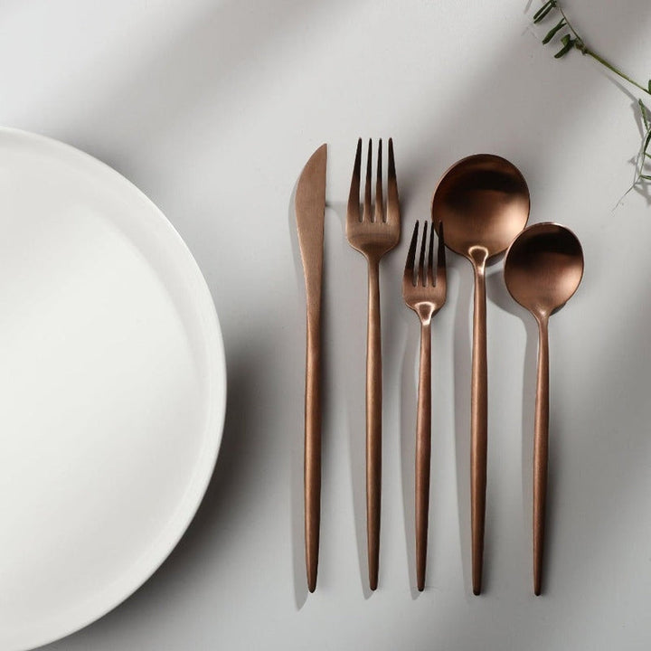 PureSet minimalist dinner knives, forks, and spoons, ready for your next dinner party.