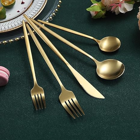Grouping of PureSet modern cutlery pieces, emphasizing the cohesive minimalist design.