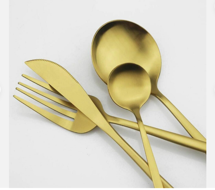 Close-up of a minimalist dinner fork from the PureSet cutlery, sleek and ergonomic.