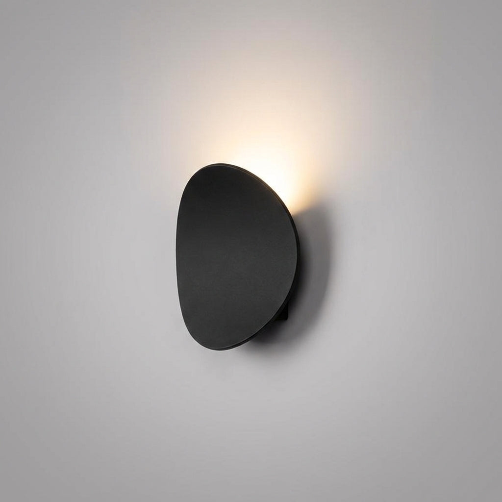 Sleek modern minimalist LED wall sconce by Serevex. Aluminum fixture enhances contemporary indoor decor with soft ambient light.