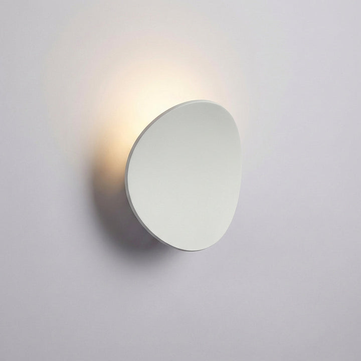Stylish Serevex LED wall sconce for modern home lighting. Minimalist aluminum fixture provides energy-efficient, ambient indoor light.