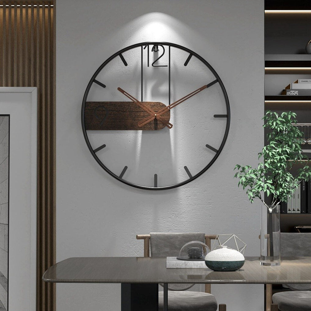 Modern minimalist wall clock with decorative natural wood frame. Silent quartz movement for home or office decor.